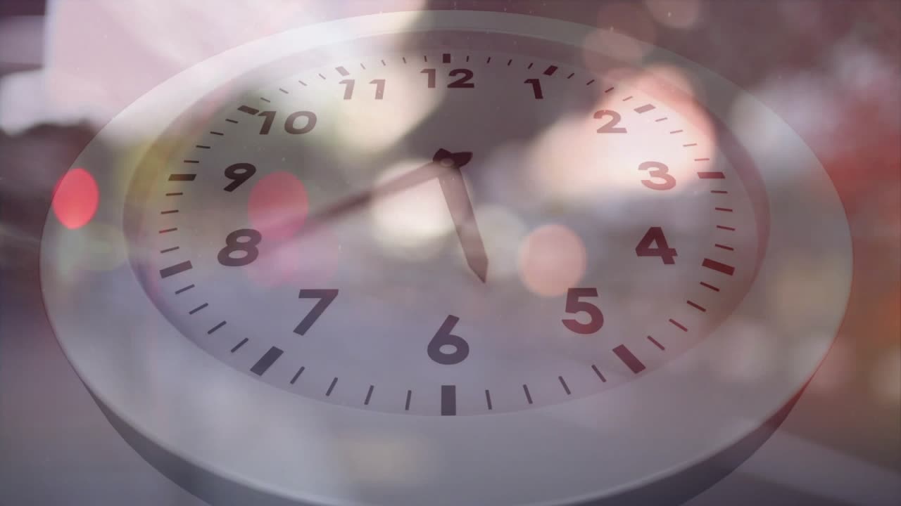 Opening closeup showing clock hands rotating clockwise marking time lights dimming revealing stars