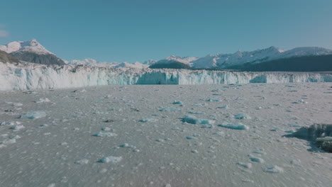 Aerial-flying-over-the-icy-expanse-of-the-Columbus-Glacier-in-the-scenic-Alaskan-wilderness