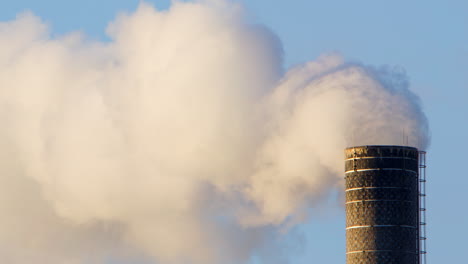 Air-pollution-by-industrial-factory-chimney-emitting-toxic-gases,-zoom-in