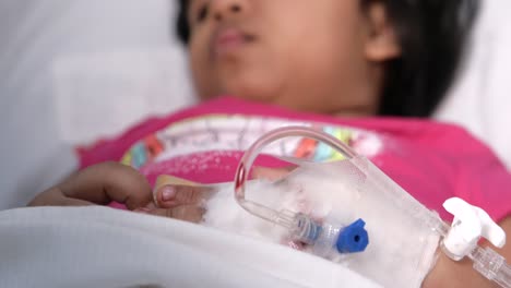 child patient receiving iv treatment