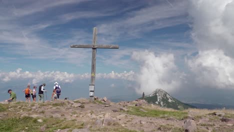 hikers at the top of mount schwarzhorn - corno nero on a nice summer's day, south tyrol, italy