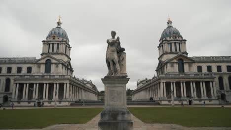 statue in front of the royal naval college, greenwich, london