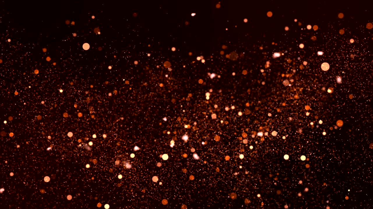 chispas brillantes volando en el fondo de movimiento borroso