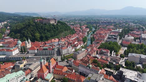 summer aerial view of ljubljana old town, featuring the castle and elegant prešeren square