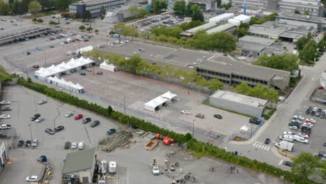 aerial view of a covid-19 drive-through mass vaccination site to prevent spread of virus