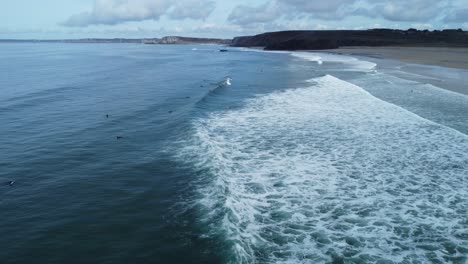 wave filmed from the side, on the beach of la palue in brittany in france