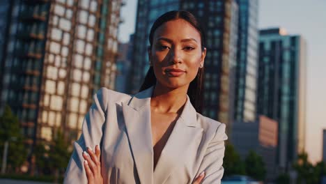 confident businesswoman in cityscape