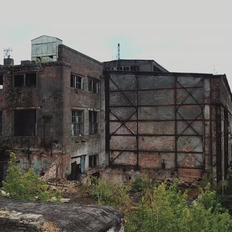 aerial view from the air to an abandoned factory. old industrial building for demolition.