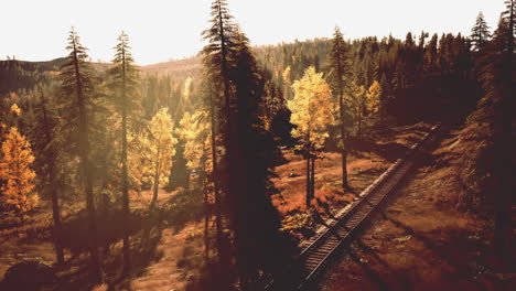 autumnal mountain railroad scene