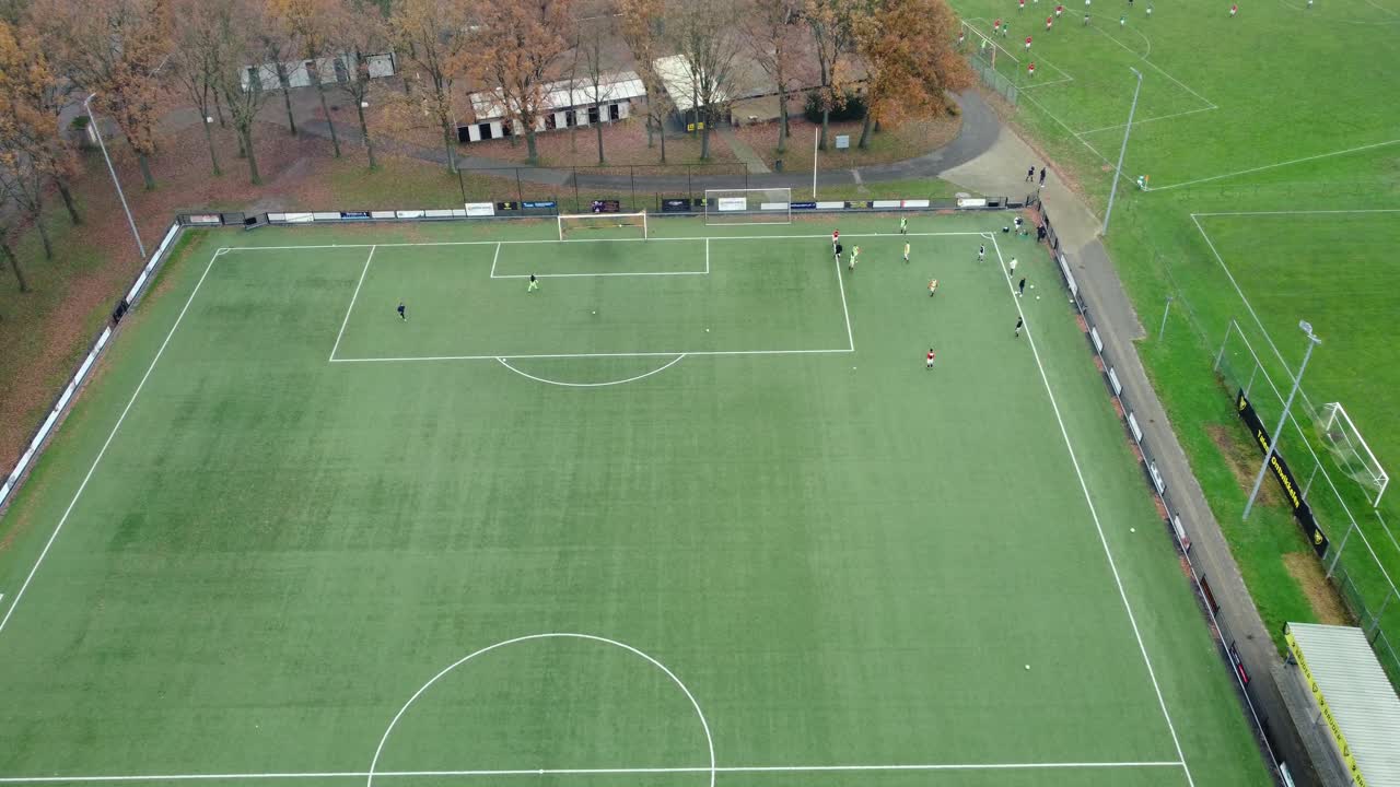 Aerial view of a soccer field with players