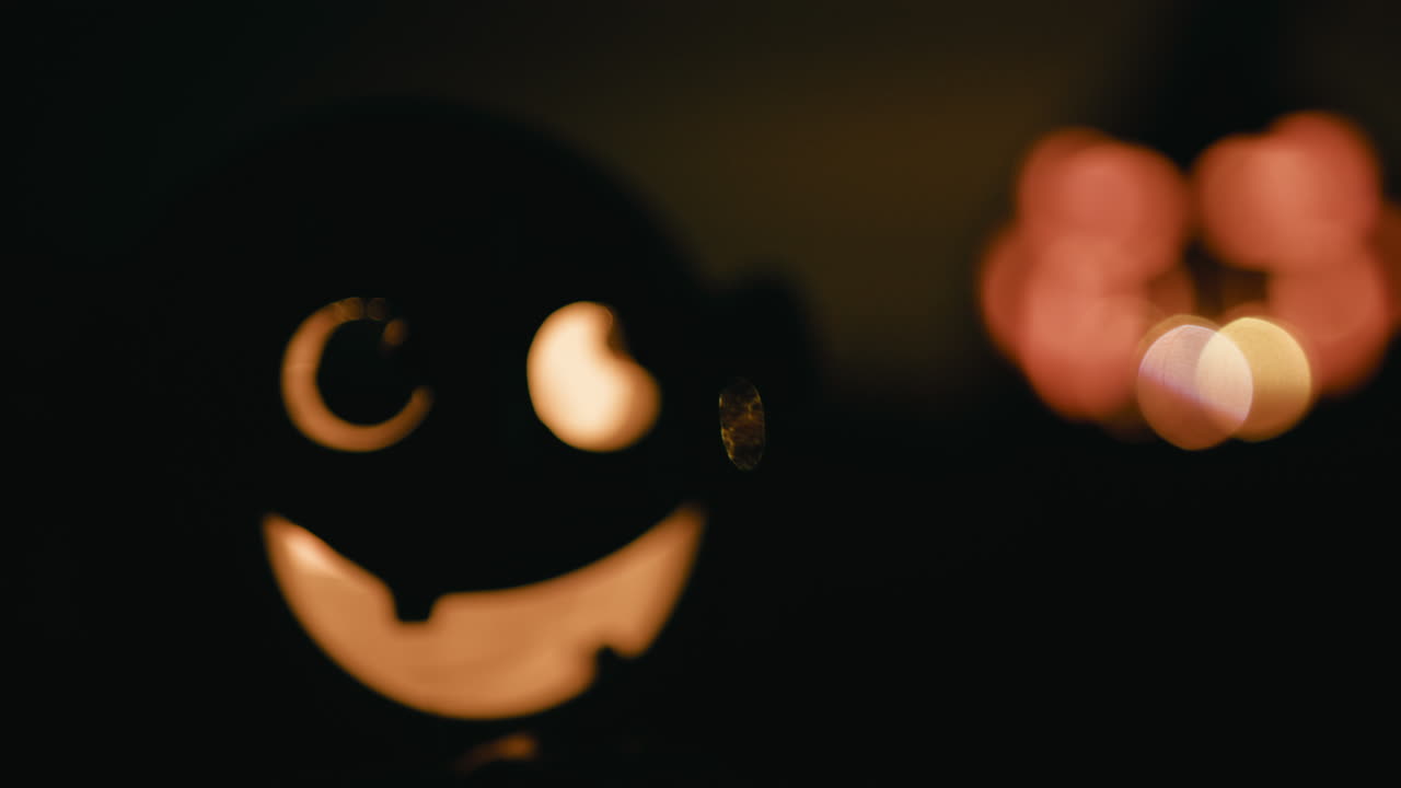 Scary Smiling Halloween Monster Illuminated at Night