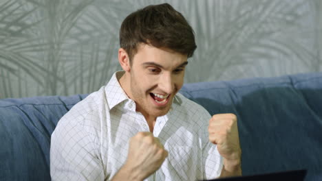 excited businessman celebrating success