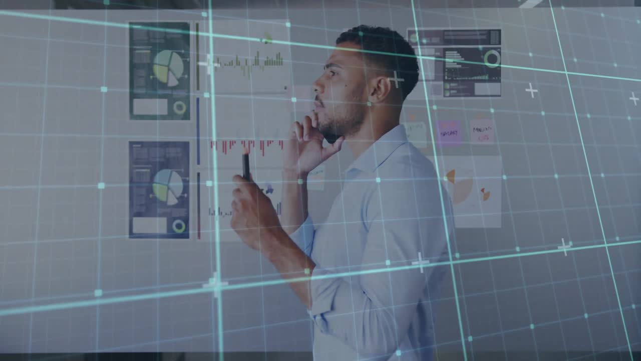 Marketing analyst tapping smartphone then annotating chart with digital grid overlay for planning