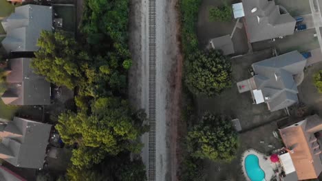 drone flying over railroad tracks with straight down view