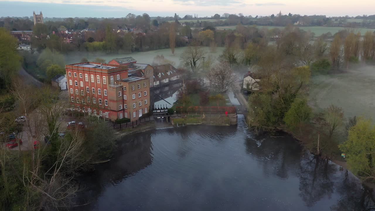 Drone footage over Dedham Mill at sunrise towards Dedham