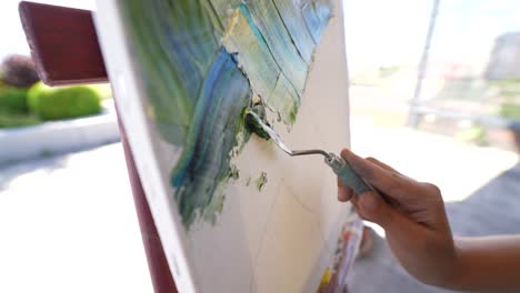 painting in progress with palette knife