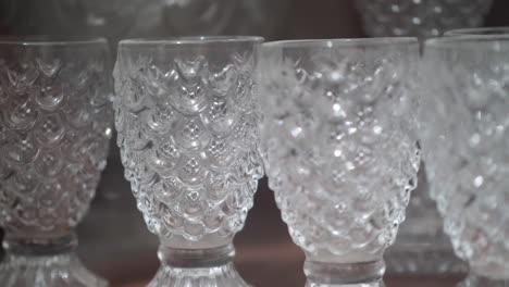 Fancy-Crystal-Glasses-On-Cabinet-Shelf