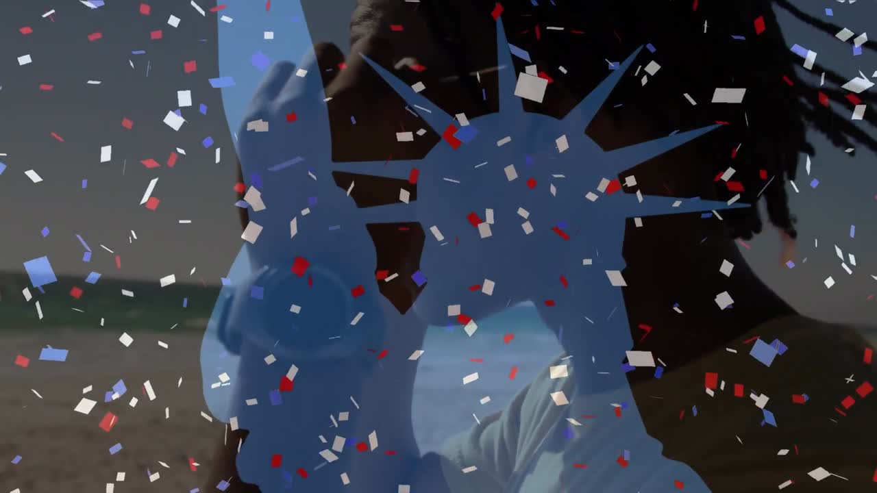 해변에서 아프리카계 미국인 여성 위에 자유의 여신상과 콘페티의 애니메이션