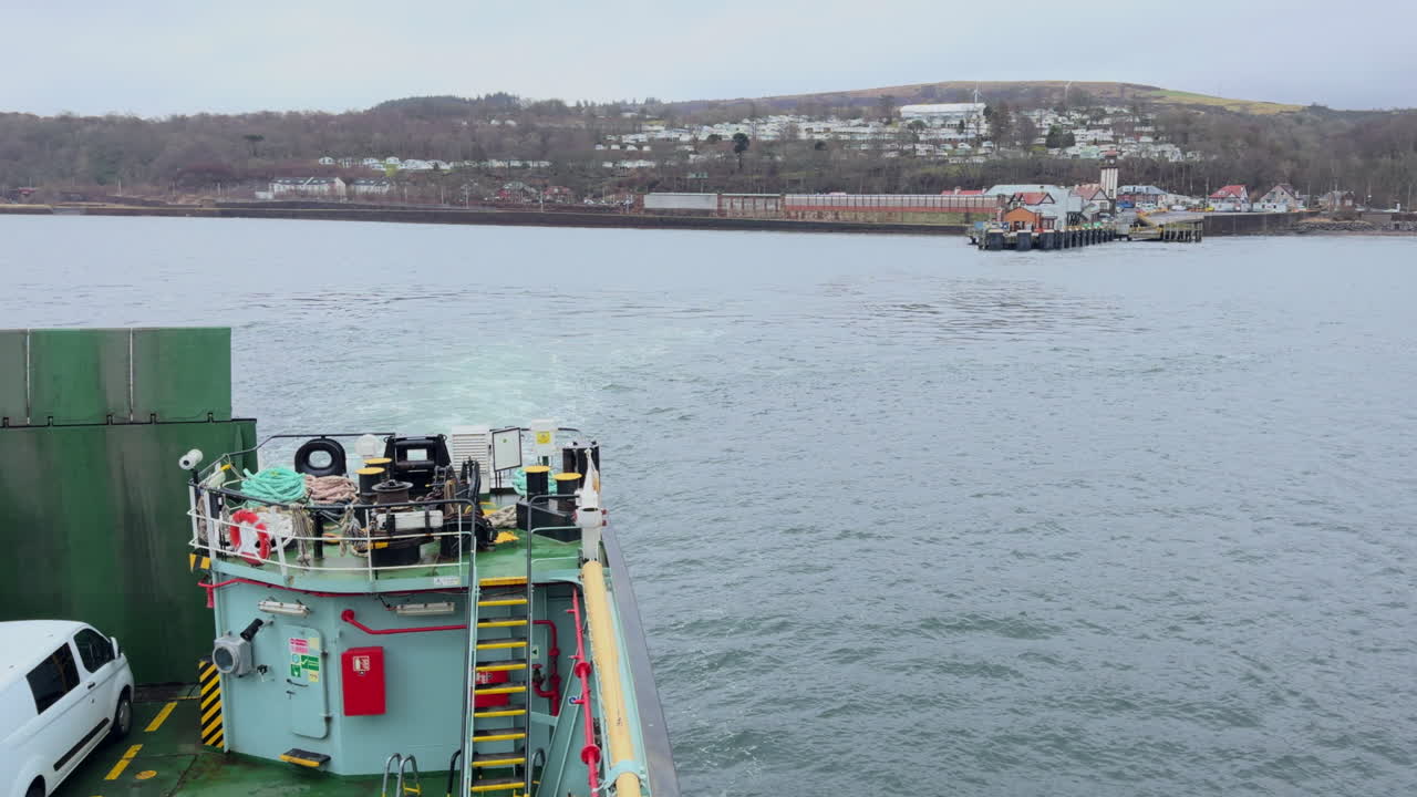 A passenger ferry leaving the port of Rothesay on the Island of Bute in Scotland, United Kingdom.