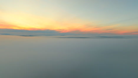 beautiful sunrise in lapland over morning mist