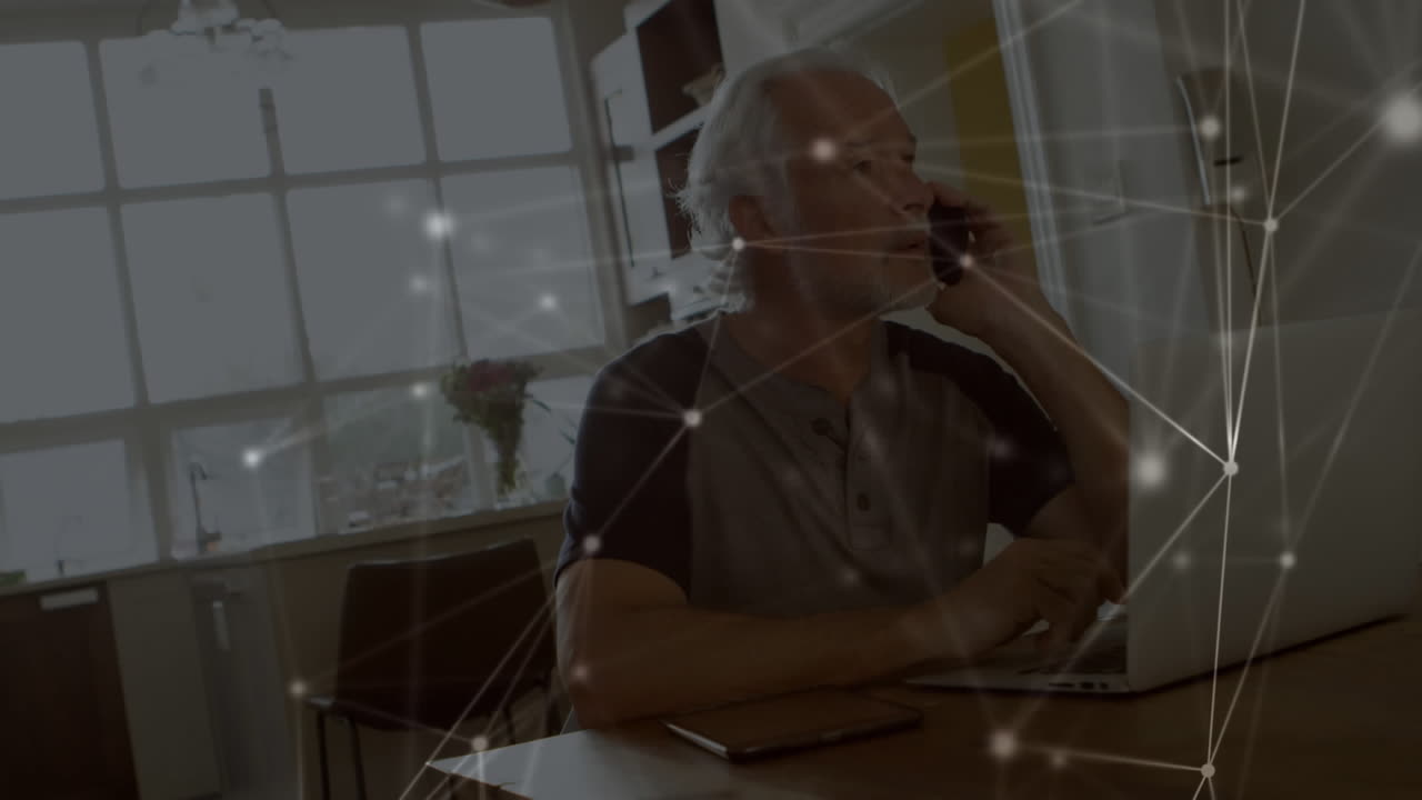 Web of connections against senior man talking on smartphone