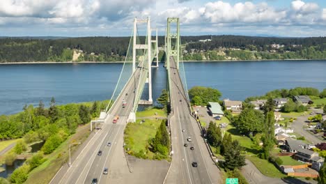 clouds boil above the tacoma narrows bridge, puget sound, aerial hyperlapse dolly zoom