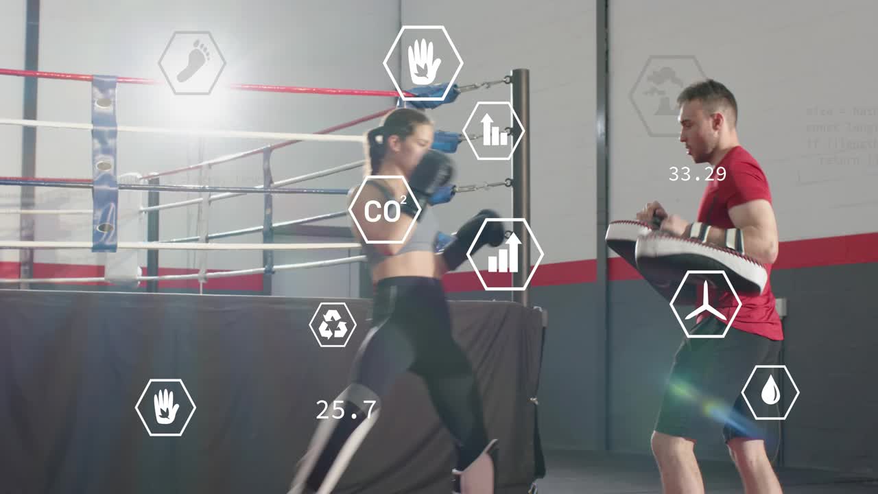 Boxer stepping in and striking mitts while trainer shifting pads boxing telemetry overlaying timing