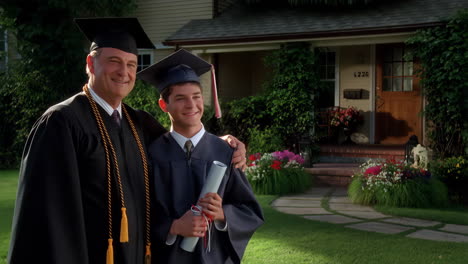 father and son celebrating graduation day