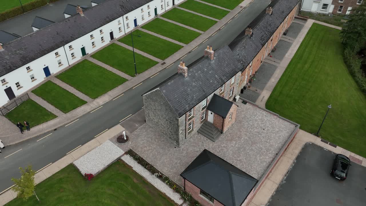 Aerial View of a Charming Village with Traditional and Modern Houses