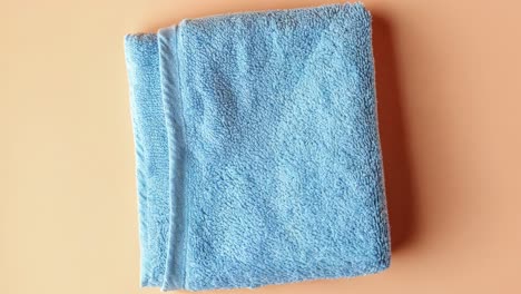 folded light blue towel