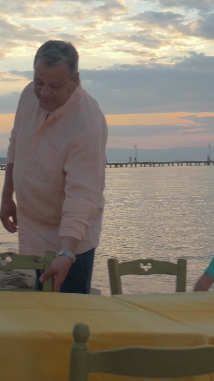 Family enjoying a sunset at the beach