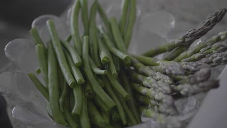 closeup of green beans and asparagus in a bowl