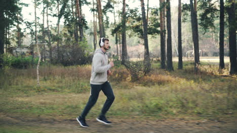 man running in forest park