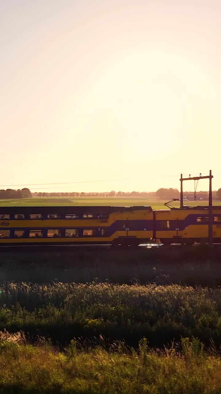 Train Through the Countryside at Sunrise/Sunset