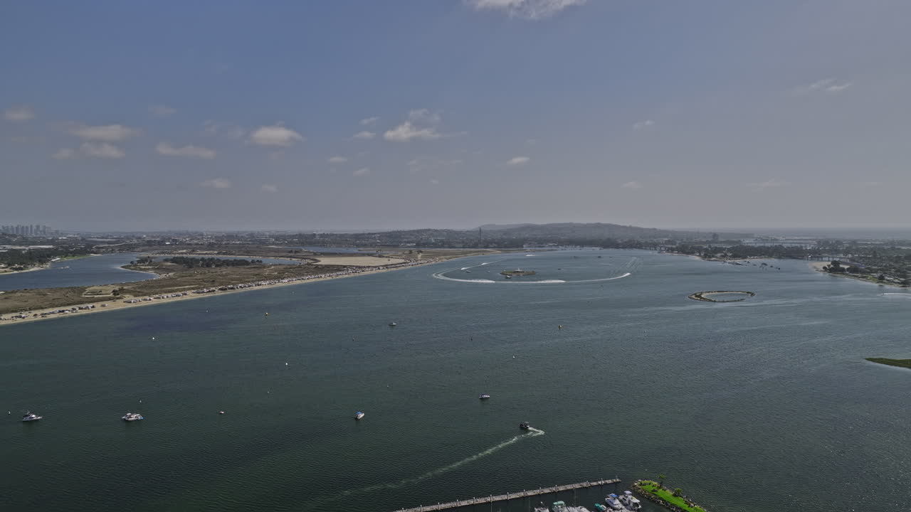 San Diego California Aerial v79 flyover fiesta mission bay capturing powerboats racing in laps on the water with crown point park views in the background - Shot with Mavic 3 Cine - September 2022