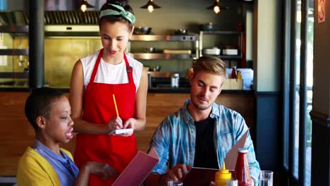 waitress taking order from customers