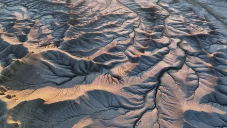 cinematic aerial forward over huge desert mountain panorama in utah, sunset