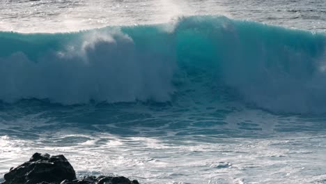 powerful atlantic waves crash against the rugged volcanic coastline near timanfaya national park in lanzarote, part of spain’s canary islands.