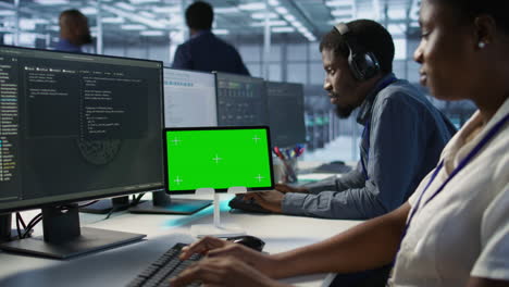 it staff working in a server room