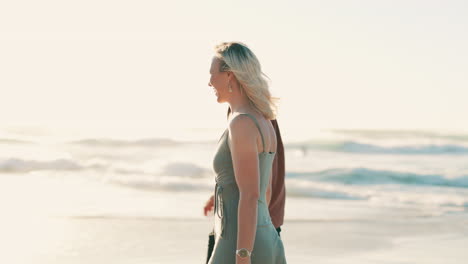 Beach,-sunset-and-couple-holding-hands