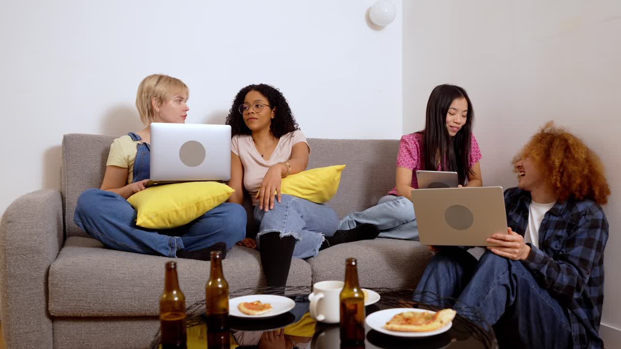 Group of Friends Relaxing with Tech and Snacks