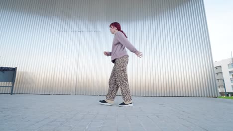 young urban dancer performing energetic street dance routine