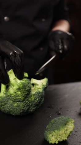 chef cutting broccoli