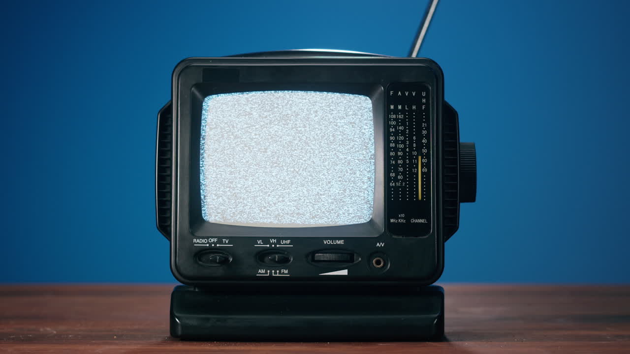 A retro television with static on the screen