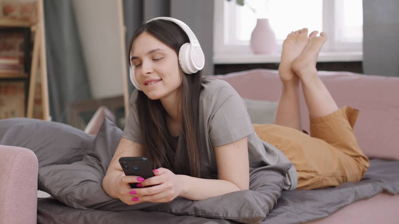 Happy Woman Relaxing and Enjoying Music