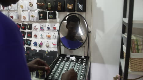 back view of young man in a store