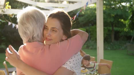 Family-eating-outside-together-in-summer