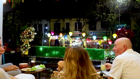 friends enjoying a meal at a vibrant restaurant