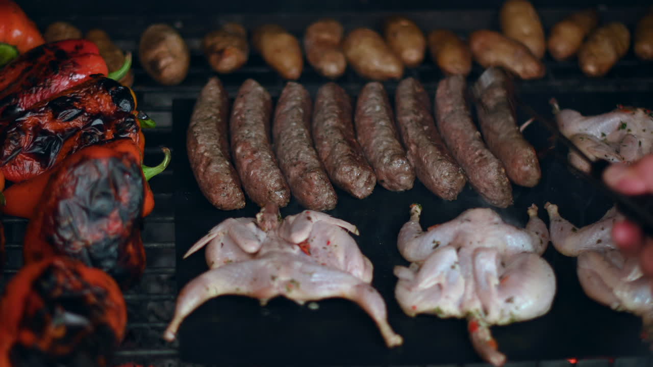 Bbq beef and quail meat on grill with vegetables