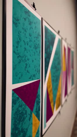 vibrant geometric abstract art displayed in a gallery